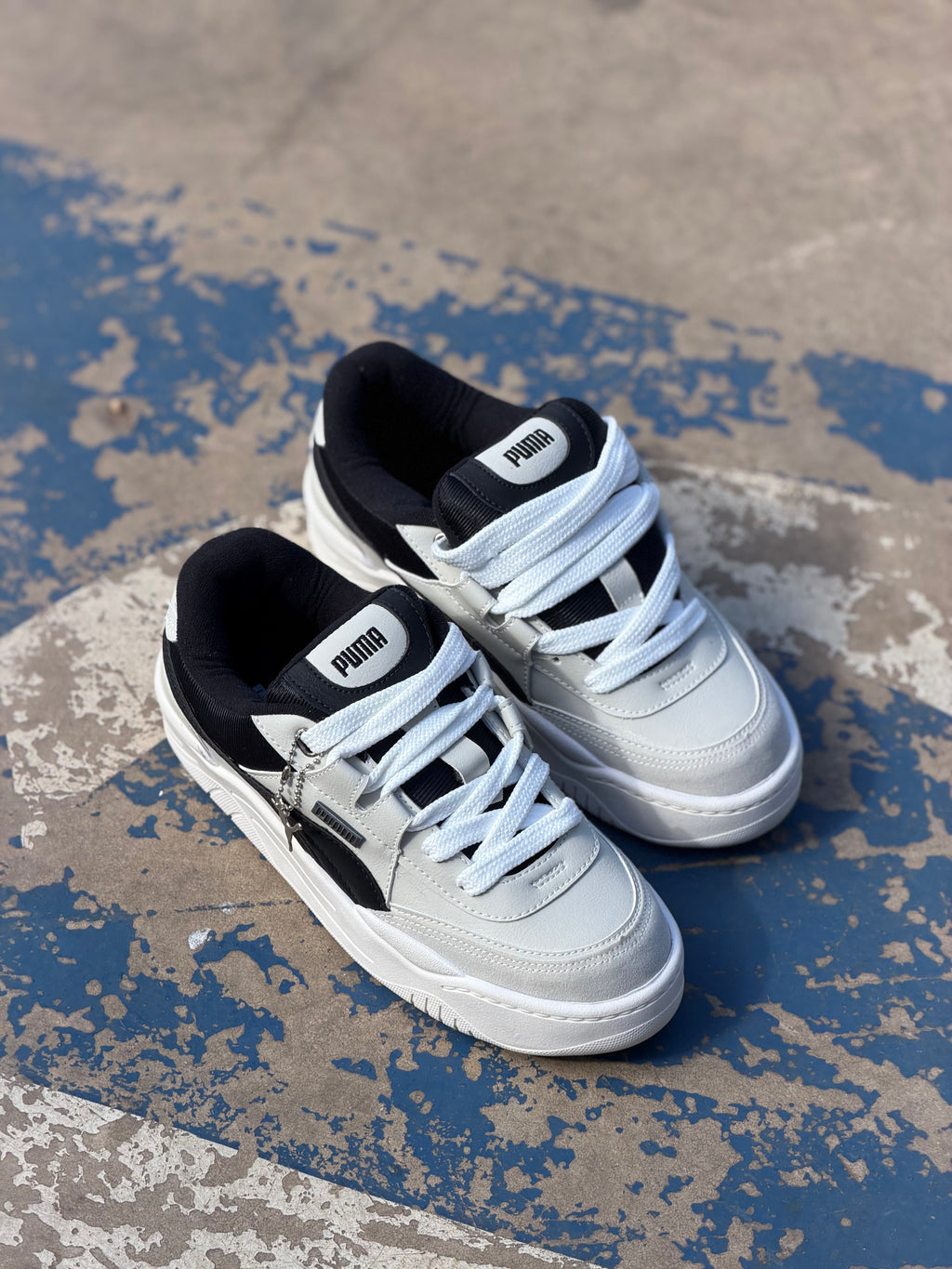 Tênis Puma preto com cinza